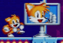 photo of tails from sonic the hedgehog excitedly smiling beside a sign depicting tails from sonic the hedgehog smiling and giving a thumbs up